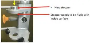 Spread a dab of grease on the new stoppe