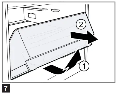 Removing the fruit and vegetable container