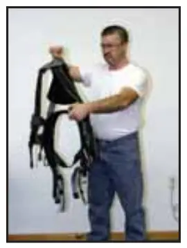 MILLER RKN TB UBK Standard Revolution Harness - Donning the Revolution with Belt 2