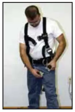 MILLER RKN TB UBK Standard Revolution Harness - Donning the Revolution with Belt 5