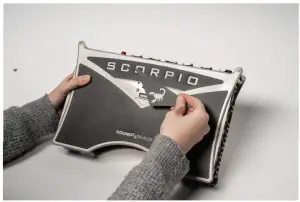 Remove the magnetic expansion port cover