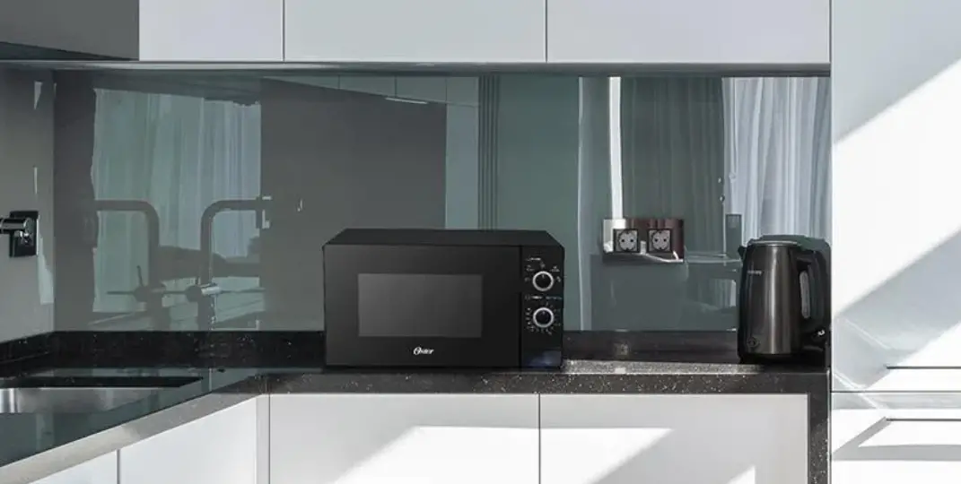 Oster Pogm3702 Microwave Oven Instruction Manual Oster Pogm3702 Microwave Oven Instruction Manual