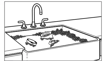 CLEANING THE GLASS TEA KETTLE AND ACCESSORIES Figure 1