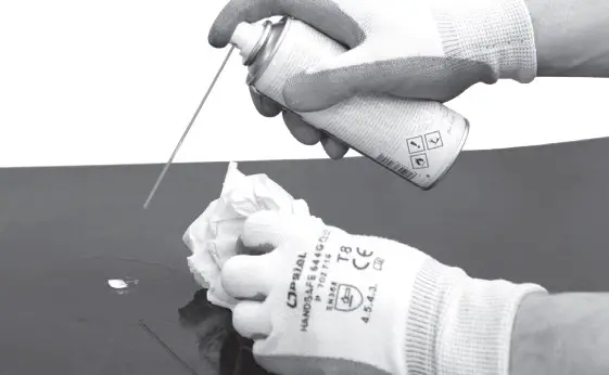 Use the spray on the glue remaining on the metal sheet.