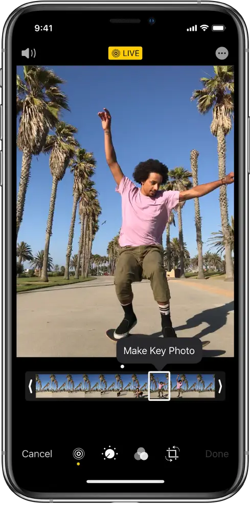 A Live Photo screen with the Live Photo in the center. The Live button is in the top middle, and the Sound button in the top left. Beneath the Live Photo is the frame viewer with the Make Key Photo button active. On either end of the frame viewer are two bars that allow you to trim the Live Photo.
