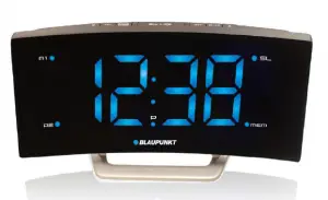 a clock mounted to the monitor
