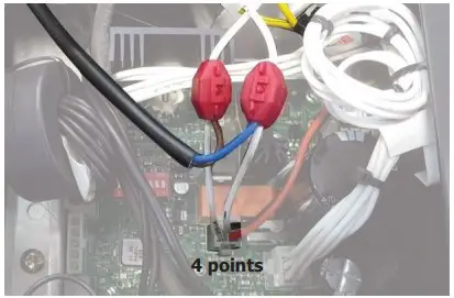Pull back the clips on the white wires of the 4-pin connector.
