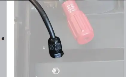 Tighten the gland ring to lock the bundle