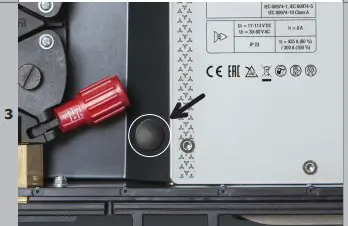 Remove the plastic cap* next to the wire feeder