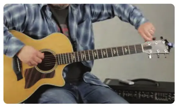 Move the needle of the tuner to get the right tune of the string