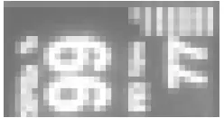 a close up of text on a tile floor