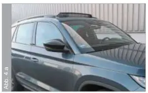 Open the sunroof on the car