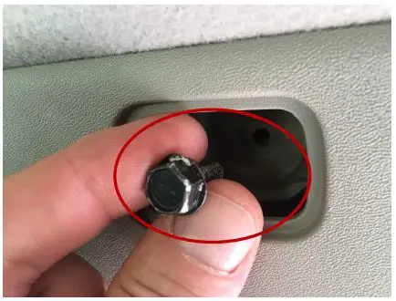 Raingler NETS GRIPS 1999-2004 Nissan Xterra Full Ceiling Net Installation Guide - Loosen exposed 10mm black bolt