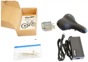 Ride1UP Roadster v2 Series E-bike Owner's - Box pedals, charger, and toolkit.