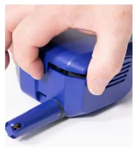 a hand holding a plastic container