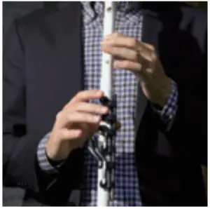 Man-Holding-Venova-Casual-Wind-Instrument