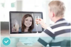 a man and a woman standing in front of a mirror