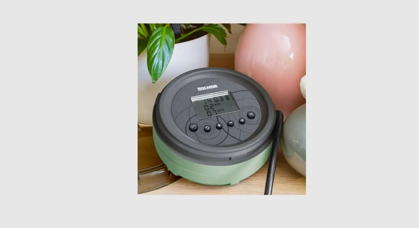 Holman Co1606 Self Watering Drip Irrigation System User Guide