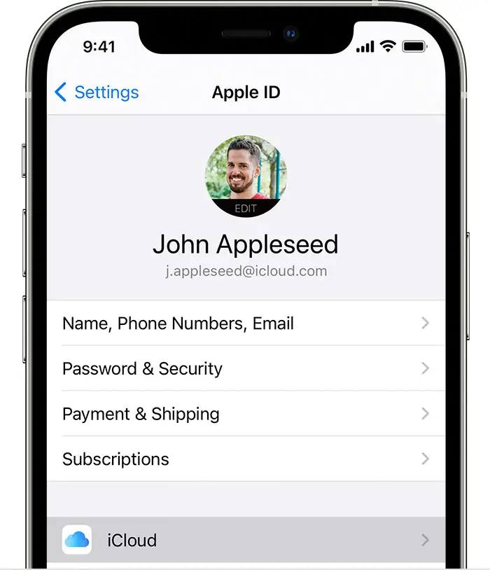 An iPhone showing the screen at Settings > [your name]. iCloud is selected.