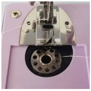 amazonbasics B085CY1MP9 Portable Midi Household 12 Stitvh Sewing Machine - Threading the Bobbin Through the Machine 1