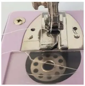 amazonbasics B085CY1MP9 Portable Midi Household 12 Stitvh Sewing Machine - Threading the Bobbin Through the Machine 6