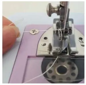 amazonbasics B085CY1MP9 Portable Midi Household 12 Stitvh Sewing Machine - Threading the Bobbin Through the Machine 7