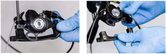 Attach the front brake caliper.