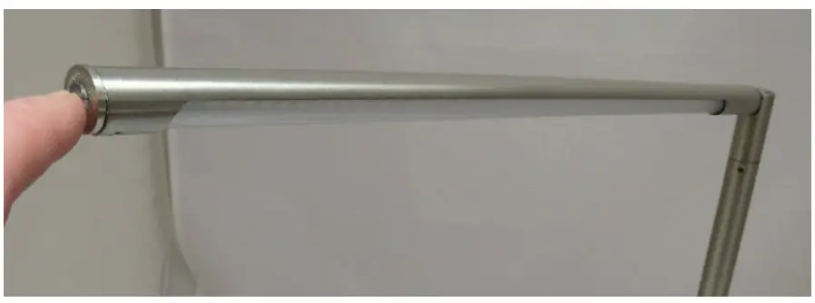 The switch is at the end of the lamp