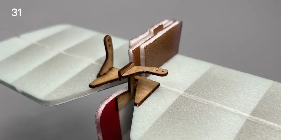 Glue the control horn parts on the tail