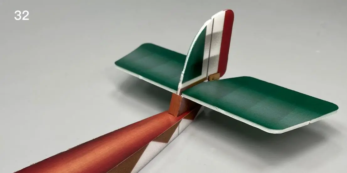 Install the tail assembly and paste the tail side sticker