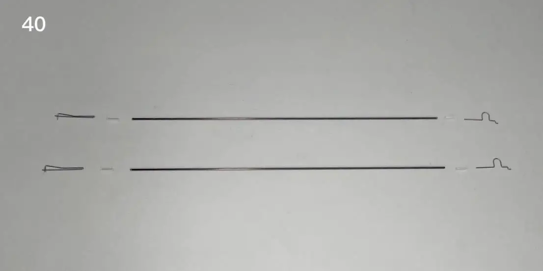 Use heat shrinkable tube to connect aileron pull rod and steel wire clip