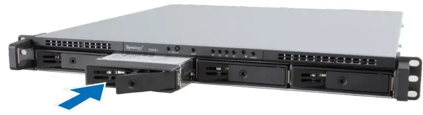 Synology RackStation RS818+RS818RP+ Installation Guide - Insert the loaded drive tray into the empty drive bay