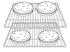 AMANA 5509105 Freestanding Electric Range - Baking Cookies on 2 Racks
