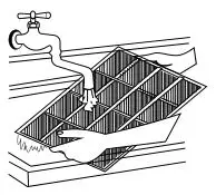 kelvinator Window Wall Electronic Room Air Conditioner - Removing the air filter