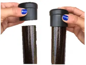 a hand holding an object in his hand