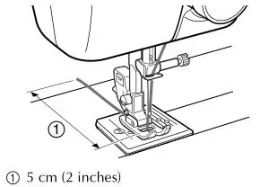 brother Sewing and Mending Machine - Thread the needle from front to back
