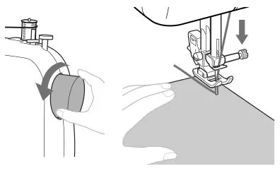 brother Sewing and Mending Machine - While holding the end of the thread