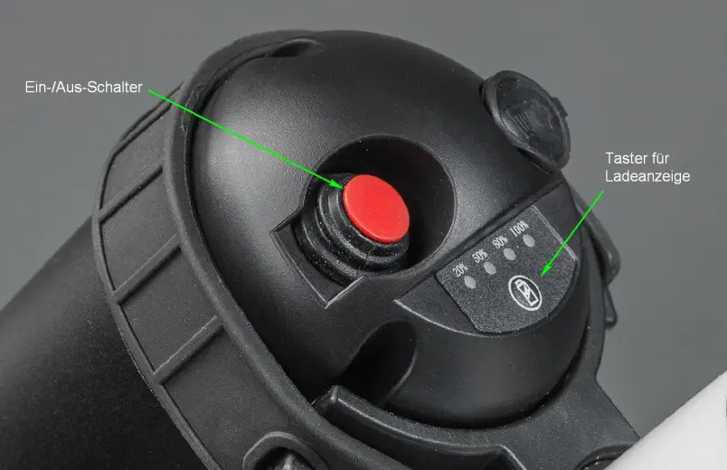 Press the red switch on the battery