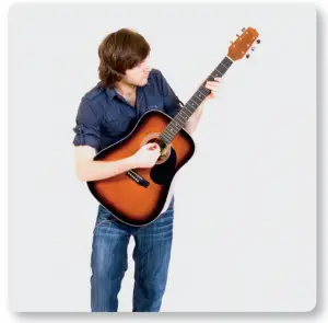 a person holding a guitar