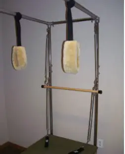 PEAK PILATES Cadillac Trapeze Table - Installing the Springs