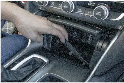Shenzhen Tangzao Technology HAD Car Wireless Charger User Manual - Push the handbrake to the rear