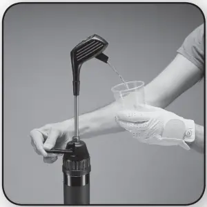 a hand holding a glass of water