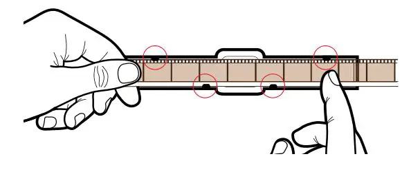 KODAK B0982P62PW REELZ Film Digitizer For 8mm & Super 8mm Film - Twist the film slightly again to fit the film under the third tab