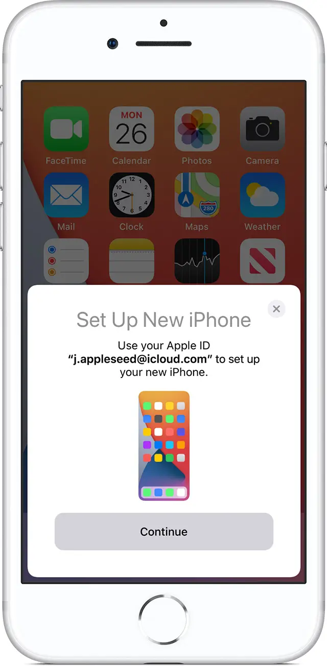 iPhone showing the Quick Start screen with a prompt to set up your new iPhone.