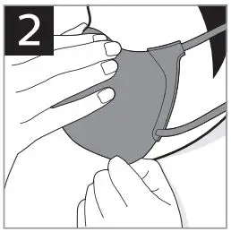 PHILIPS ACM067 Fresh Air Mask User Guide - Put the face mask on, pull the ear straps around both ears, press down the mask and adjust the nose clip to fit against the bridge of the nose