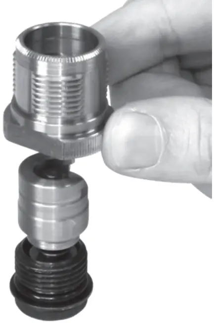 Set up swage holder with correct swage punch and shell holder