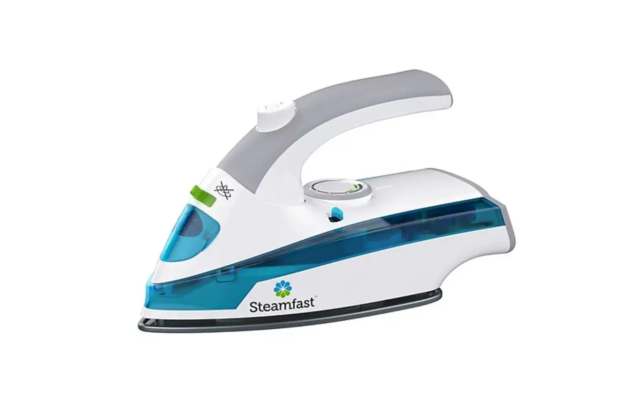 Steamfast Sf-710 Mini Steam Iron Owner's Manual