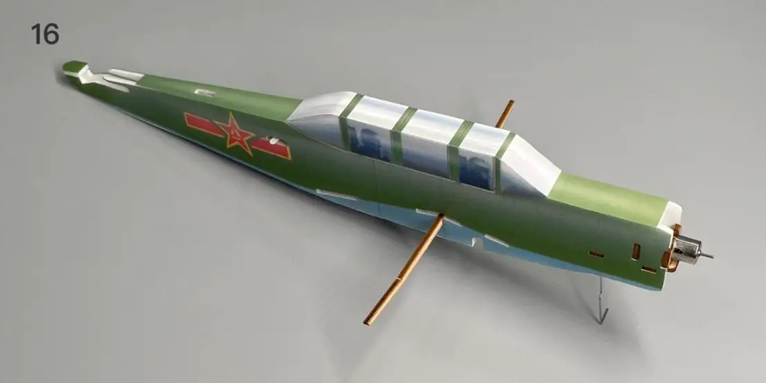 a green airplane next to a plane