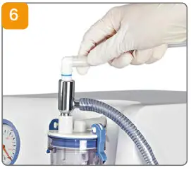 medela 077.0083 Electric Vacuum - Plug the supplied