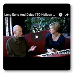 a man sitting in front of a screen